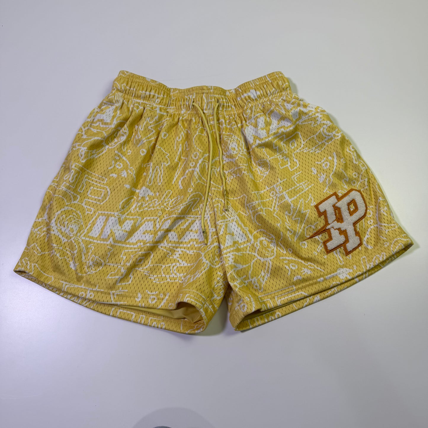 Shorts Inaka Power  amarillos (S)